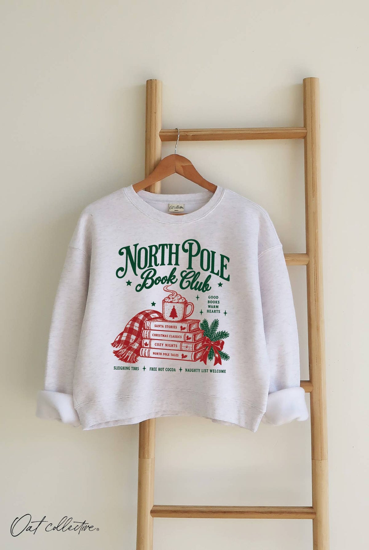 NORTH POLE BOOK CLUB  Mid Cropped Graphic Sweatshirt