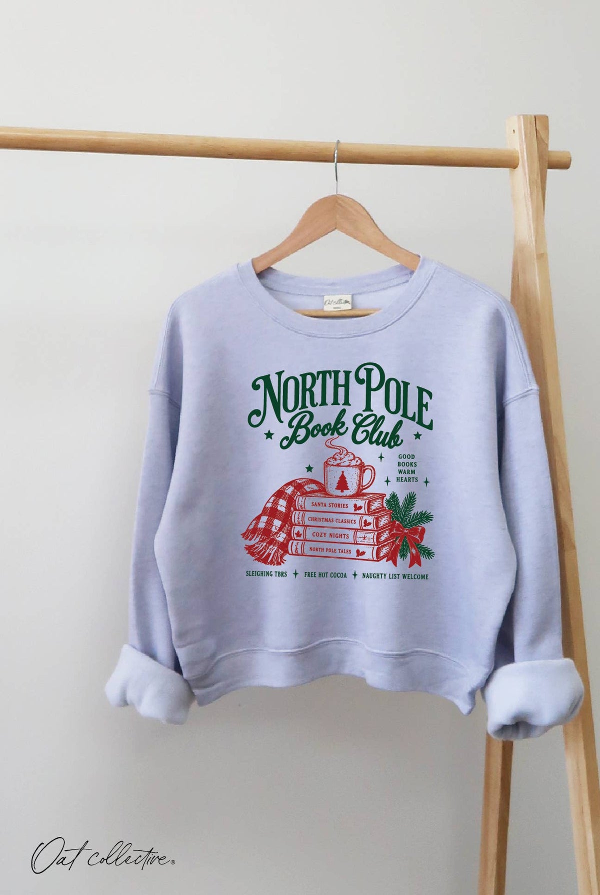 NORTH POLE BOOK CLUB  Mid Cropped Graphic Sweatshirt
