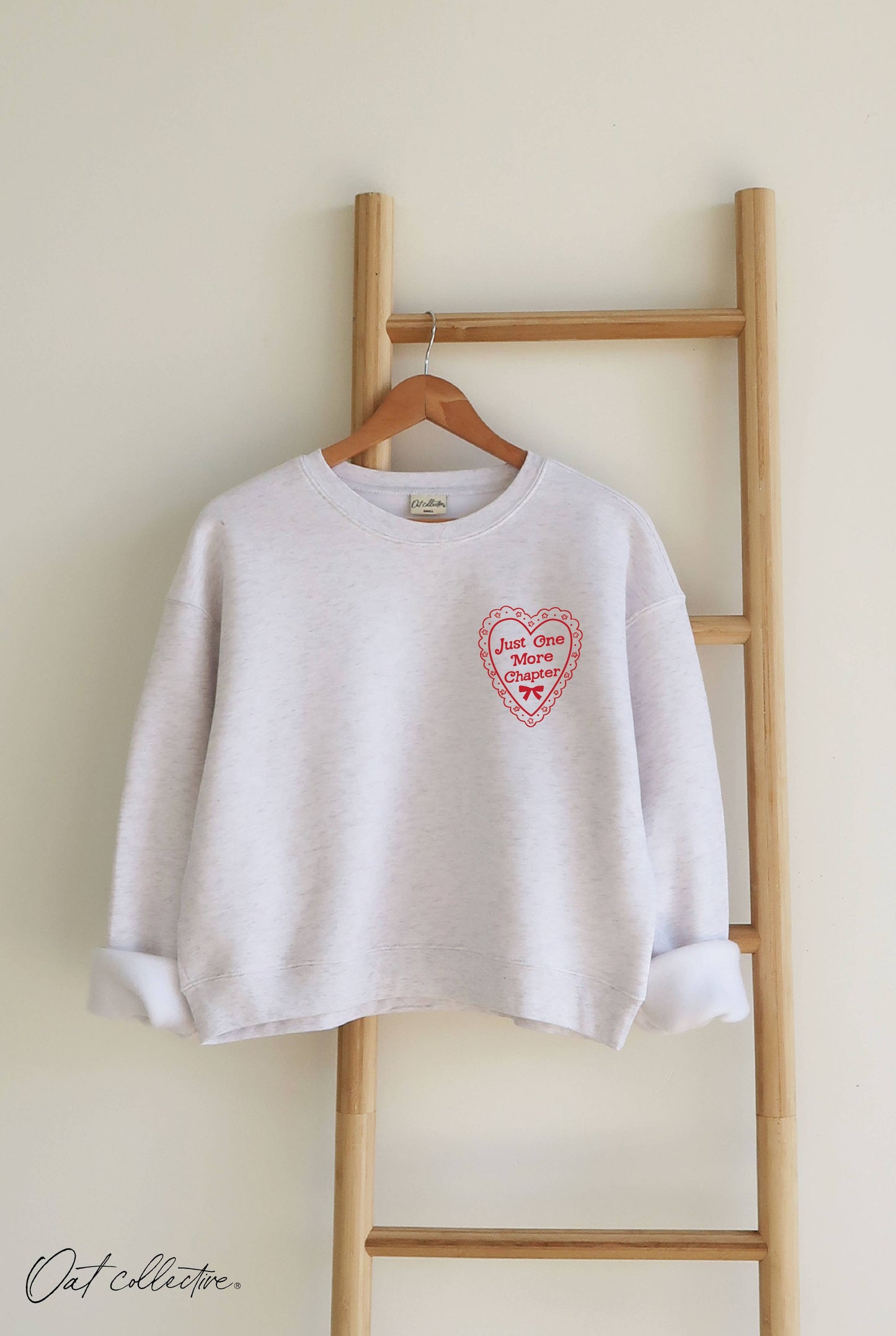 JUST ONE MORE CHAPTER Mid Cropped Graphic Sweatshirt