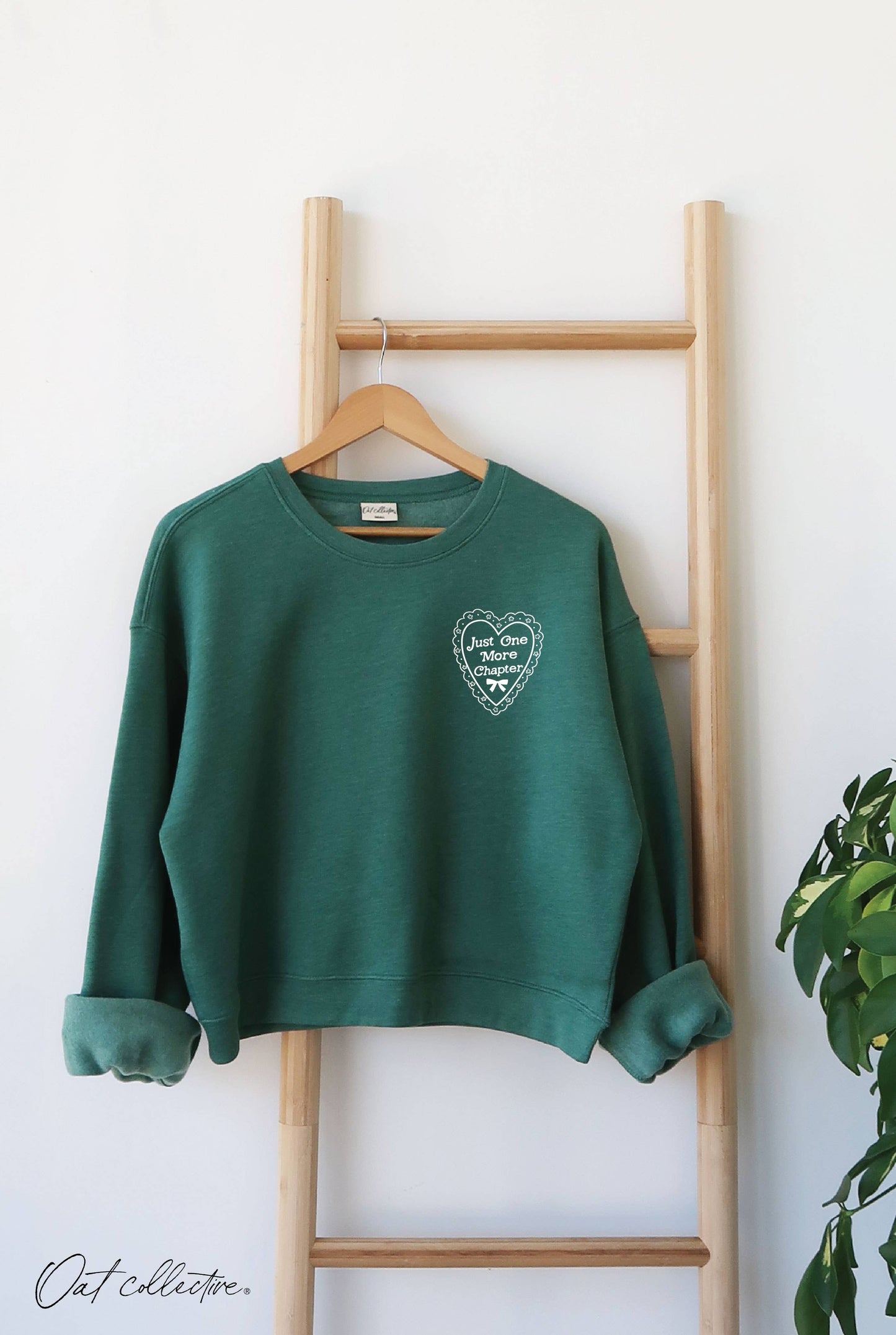 JUST ONE MORE CHAPTER Mid Cropped Graphic Sweatshirt